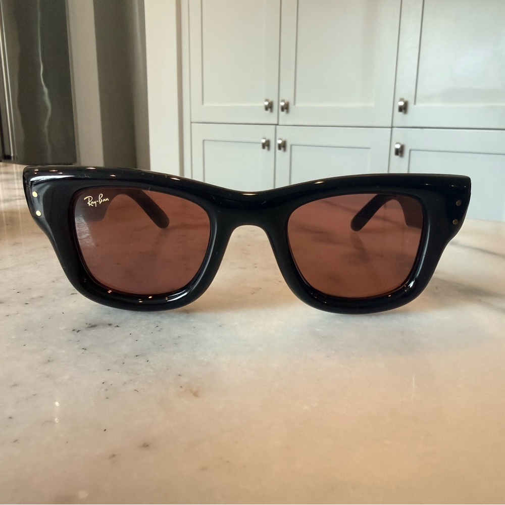 ASAP Rocky Wayfarer Puffer with polished black frame and dark violet lenses